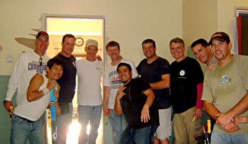 Volunteers from Bergen 32 who are working to help a local family rebuild after their home was ruined by flooding.